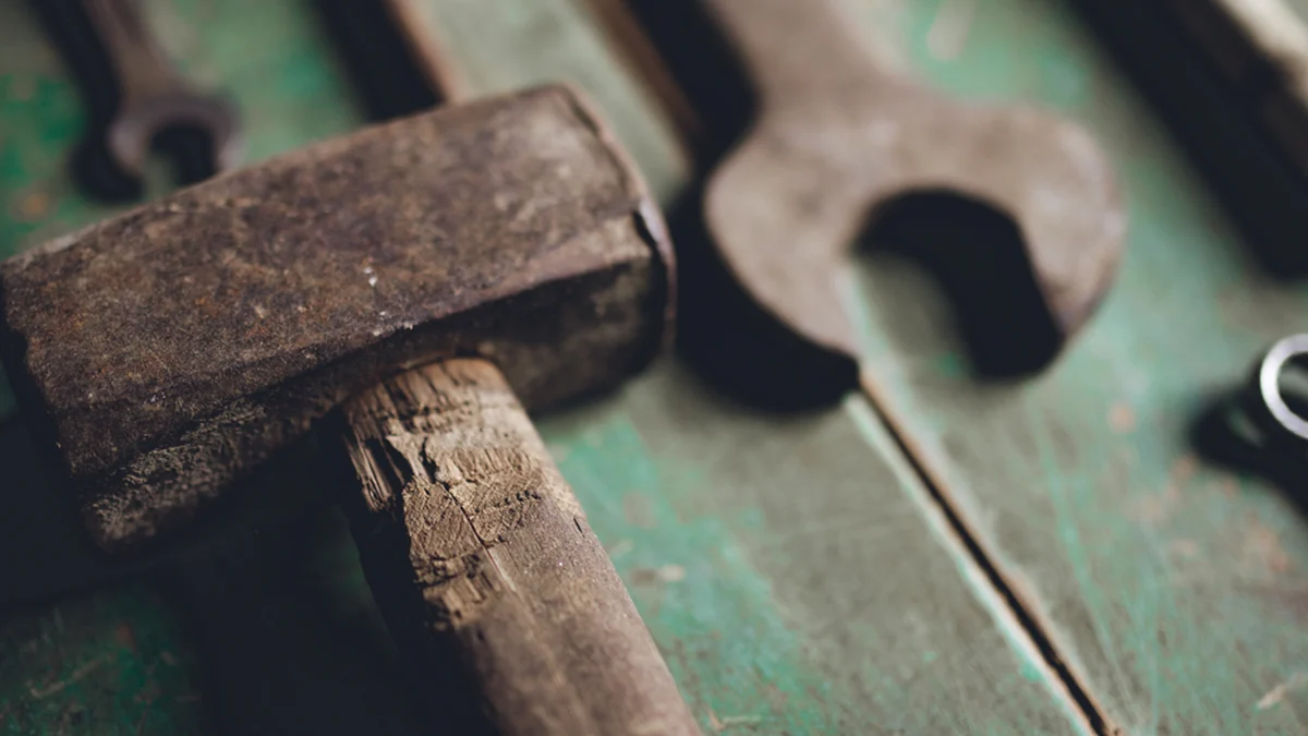 Hand tools laid out in a workshop